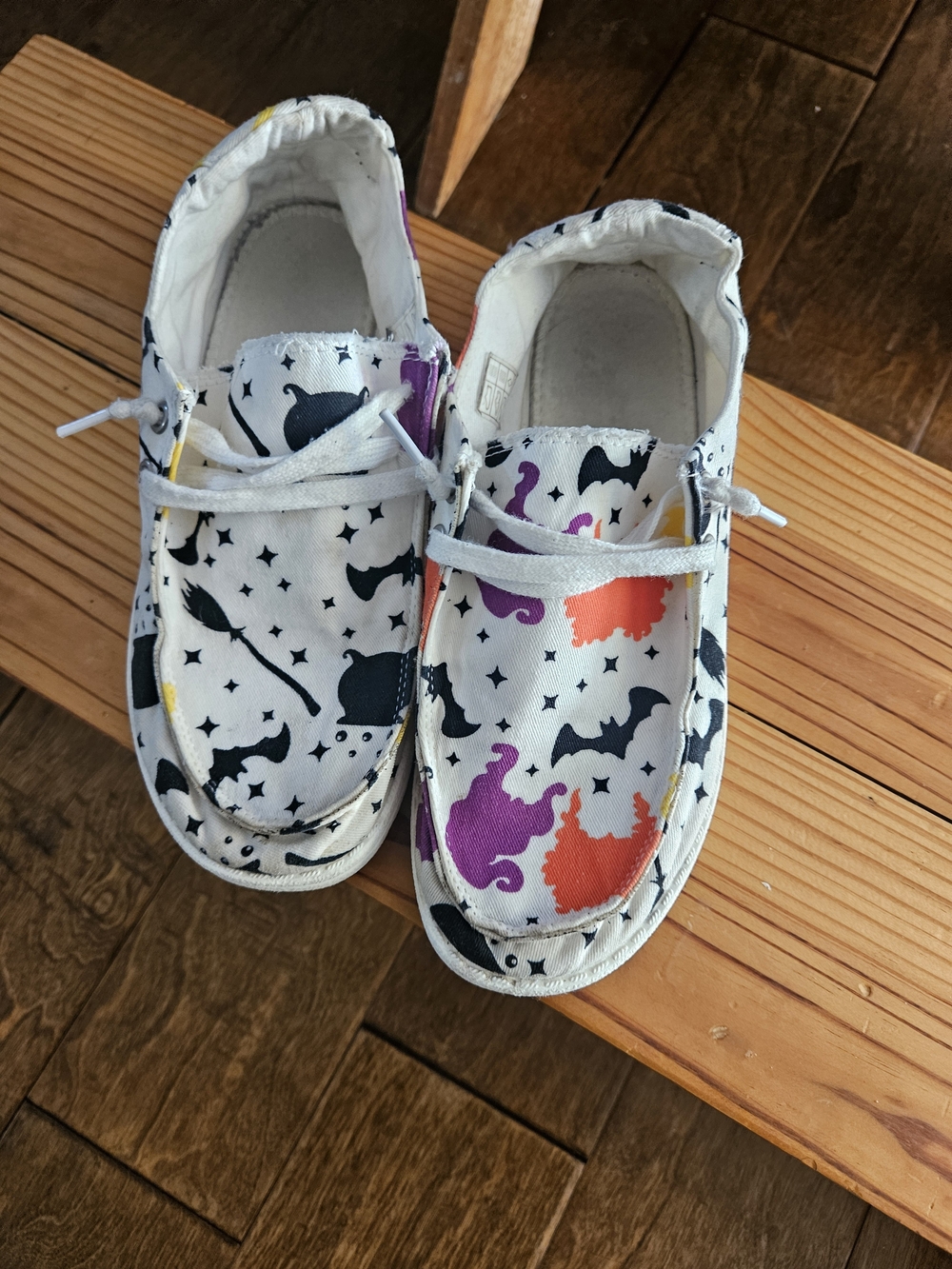 Womens White Halloween Print Slip-On Shoes with Colorful Accents